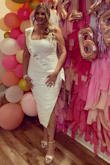 I wore this dress for my bridal shower and it fits perfectly. It has a little bit of stretch and the ruching that accentuated the curves. - Mercy L.