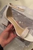 I bought these shoes to wear on my wedding day, and they're exactly what I was looking for. They look very bridal with the pearl detailing. The back does come up pretty high so I'll probably have to break them in a little before the big day to avoid them rubbing on my ankles, but they look great. - Mariah C.