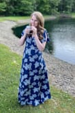 With my height I usually can't do full length dresses but this one was perfect. I wore flats probably could've gotten away with a small heel. Are usually wear a dress size 8 to 10, but I ordered an extra large for the length. Because this is a wrap dress it worked perfect. - Erin P.