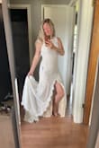 This is my second wedding and I didn't need a huge gown, so this is the perfect middle ground. It's super comfortable, thick material, easy to put on and take off, and has a cute open back. It had good reviews and I agree! I love this dress. I need to lose my belly pooch, but other than that, it fits perfectly. - Jessica M.