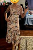 This dress was perfect for a wedding. The colors are lovely and the fabric felt high quality and hung well. I'm short so this dress was a little long but still very flattering. I have a muscular upper body and the tie straps made it nice to adjust. I ended up wearing a regular bra with this but in the future, I would probably use a sticky bra so I'm not adjusting the straps all night. I usually don't wear a bra but this dress needed a touch filling out. - Sarah D.