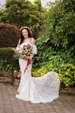 Absolutely stunning dress! Exactly what I was looking for to fit with our boho theme. I'm usually between XS and S depending on style. The XS fits perfectly and shows off my curves and waist. - Joanna T.