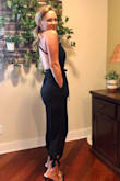 This jumpsuit can be worn a multitude of ways depending on how you tie it. I have a very long torso and it totally fit. Was going to use some booby tape, but honestly, it kept my 34B girls in place without it. I have a small waist and wide hips/thighs and it made the best of both. Do yourself a favor and get it.. - Amanda B.