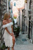 Such a cute dress for a bride-to-be. The quality is good, it's not see-through, slit is perfect and the dress moves comfortably. I normally wear an XS and that's what fit me in this case too. Would recommend! - Amanda K.