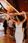 The dress was so flattering and fit very well. I didn't even need to wear a bra (has adjustable straps) the only reason I didn't give it 5 stars is that the beading of the dress kept rubbing against the inside of my arm which kind of sucked and was super uncomfortable. But my arms were up dancing all night I didn't even care after a while (and a few wines) haha still would definitely recommend this dress! - Jocelyn B.