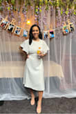 Loved this dress for my bridal shower! Classy look for brunch party and cute open back. Ordered a size S- a little tight in the chest but I prefer it like that so I don't have to wear a bra. If I went up to a M it might have been bagging in the back and too loose in the skirt. Would recommend this dress! - Anastasia H.