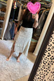 I like this skirt, however, the cream color is see-through. You'd have to wear a slip under it because even if you wear skin-colored panties you can't still see them. May return and get the other color option. Fits well though. - Danielle R.
