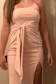 Looked at other reviews and the pictures and saw how great it looked, but when I got it, it fit very weird, big in the waist and big on the strap. Wasn't flattering at all! - Rebecca N.