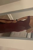 The dress was really long so I hemmed it. I really liked wearing it but could not move my arms very well - Megan W.