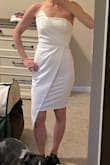 I love this dress!! Bought it for my wedding rehearsal dinner and it fits perfect. The material is nice and on the thicker side, and there is a sticky material to hold up the strapless. Would def recommend! - Michelle P.