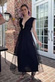 I absolutely adored this dress!! It is so beautiful and flowy, can't wait to find another occasion to wear it!! The little sleeves are the cutest! I taped myself in for extra security but it wasn't going anywhere! - Ana B.