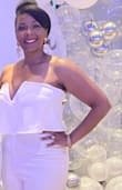Fits great! Pants too long even with heels. Had to get hemmed. Great fabric quality. I lost a few pounds after it was hemmed. However, I think a small would've been too snug. - Bonita D.