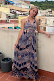 Runs a bit big, so I ended up swapping small for extra small, which I would never have predicted. The elastic around the bust felt loose otherwise. Flows beautifully. Can dress up or down. - Megan F.