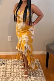 If you are curvy and have wider hips and rear would size up. I Initially ordered a Large which is my usual size, but it was too tight on the hips and rear-end. I then ordered XL and it fit well. It is a very pretty dress and a great color for summer! - Am H.