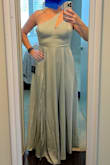 The color and fabric were beautiful. Unfortunately, the bust sat weird and tightening the straps didn't help much. Also the skirt is much fuller than it appears in the picture which made the slit not as pronounced as I would have wanted. I wanted to love it but unfortunately sent it back - Nikki K.
