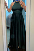 This just showed up and looks great. It looks much more expensive than it is, is a flattering cut and beautiful color. It fits pretty true to size, maybe even a bit large so size down if you're between sizes. Highly recommend for a black tie event. I'll need to get it hemmed a bit and I'm already pretty average height but that's not too disappointing. - Nikki K.
