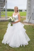 The only thing that could be improved is the top- my grandmother had to sew in some satin material - otherwise it just looked like bathing suit pads in a gorgeous dress.
I normally wear a 4 or 6 and ended up with a 2! - Lindsey B.