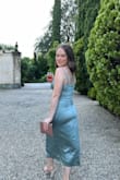 Wore to a wedding in Italy, and it was absolutely perfect. Classy, while also being a little sexy. One of those dresses that I put on and immediately fell in love with. Can't recommend it enough.
I will say, it's a little tight around the chest area, but I wouldn't advise sizing up. - Claire C.