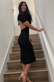 Wore this dress to a friend's wedding and received so many compliments. The material is great and it fit true to size. It hugs in all the right places. I love the versatility of it, I plan to wear it to an upcoming Broadway show. - Jenna M.
