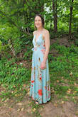 This dress is a dream! So much glamor...I bought this dress for a black tie wedding this summer. I had to send back the dress I first purchased due to size, but when I opened the package I was so pleased by the rich coloring and beautiful satin fabric! The satin, the beautiful floral print, the cut and style of the dress was simply elegant. The slit was revealing enough, while maintaining the elegance. I am quite small busted, so the adjustable straps were a must! Thank you for that! I also felt that they were thin enough for elegance without being so thin they are too delicate. The back required a small safety pin to conceal my strapless bra, but that worked perfectly. I am 5'8" and wore a higher wedge heel for comfort, the length was just perfect!
I purchased rhis dress in emerald and sage, for two weddings, both are incredibly beautiful. 
compliments all evening at the wedding! And when dancing all evening, the gown flowed beautifully and was very comfortable.
I loved everything about both dresses! - Sarah D.
