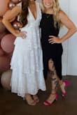 I loved this dress. If I could wear it every day, I would. It was so comfy and such a hit for my bridal shower! It was flattering in the chest area. The layers were just enough to make you feel feminine and sassy at the same time. - Leigh A.
