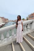 The dress was a bit long and was dragging on the floor but the dress fit perfectly. - SHARMILA S.