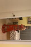This dress is beautiful but if you are short, you have to have it altered. The material is awesome but it has 2 layers which makes you hot! - Angela F.