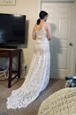 This dress is beautiful & beautifully made. It fit me absolutely perfectly. Snug, but not restricting. Intricate detail, especially the train! Unfortunately, I don't like the way it looks on my body, so I will be returning it! Also, the zipper clasp was broken when it arrived. - Abby J.