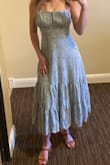 I LOVE this dress. Fits perfectly and can be dressed up or dressed down, and is very comfortable. I'm petite and it's hard to find dresses that fit right. The XXS was perfect. - Logan M.