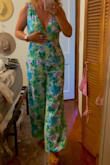 I love this jumpsuit! The colors are perfect for summer and the fit is very flattering. Love the 70s vibe of the wide leg. I ordered a large and it's a little bit snug across the back (5'6 / 155 pounds and more top-heavy) but still love it and can't wait to wear it. Definitely a show stopper. 
The fabric is good quality and it's well made. - Kristine D.
