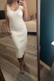 The dress is stunning. It's soft and a thick material, although I feel like it reveals the body a lot. I bought shapewear to wear underneath and it didn't show and hides what I want it to hide. It comes in two pieces and I think it looks great with or without the top piece. - Sana M.