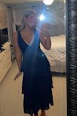 This dress is absolutely stunning and I would highly recommend anyone to buy it. I bought this dress for a wedding I was attending and ended up wearing it to every wedding I went to this summer!! Everyone loved it I got sooooo many compliments on it. I read other reviews before purchasing and it truly does make you feel like a princess. I usually buy S-M dresses as I have a bigger bust and smaller waist. The material was definitely tight on top and squeezed my ribcage, however it did a good job at keeping my breasts elevated and not saggy looking. The M might have been better for me, but I am happy with the S and would caution anyone else with a bigger bust that it is tight and hard to zip up! - Rachel C.