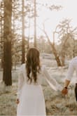 This dress was perfect for our engagement photos. It does run pretty long. I usually wear a M size, but the S worked out fine. The material is overall nice and a little see through getting the white color. The chest part was a little low cut, so I added a safety pin. - Jennifer N.
