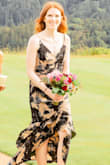 I wore this dress for an early summer wedding and it was perfect. The sizing was accurate and it traveled well without requiring anything more than hanging it up for a few hours. It had enough room in the belly that I could sit down, eat, drink, and dance. I'm happy with this purchase! - Roberta S.