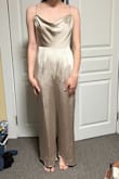 This jumpsuit is perfect! I'm going to wear it to my wedding rehearsal dinner. I found it super helpful to read all the reviews for sizing. It fits me absolutely amazingly. The length is great for me being 5'5. The material is thick/good quality but still seems breathable. I love how classy it looks while being so comfy. - Nicole R.