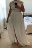 This dress is so pretty and flattering! I do have long legs and I'll certainly need to wear heels if I don't get the skirt tailored, but I knew that from prior reviews. I love the dress it's great. - Britany B.