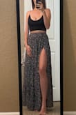 Cute skirt with a slit you can button up or down to show as little or as much leg as you like. - Kristen M.