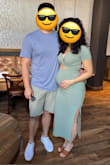 I was so happy to see expecting mamas post pictures in this dress because it definitely encouraged my purchase and I don't regret it! Material is very comfortable, stretchy and forgiving. It is the perfect in between of too thin and too thick; it's just right - you won't see thong lines or skin dimples. Also fit very comfortably around my arms - didn't feel suffocating at all. The sage green color is beautiful. I got so many compliments on how it made my 22 week baby bump look! Felt very confident and highly recommend! - Melissa S.