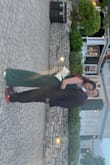 This jumpsuit fits like a dream!! I am super tall and was able to wear 4inch heels and it still touched the ground! Very comfortable and the fabric is soft and doesn't wrinkle easily.  By far my new favorite!! - Faythe M.