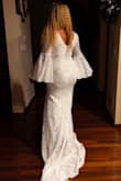 I can't say enough about this dress, it's beautiful, classy, fits perfectly on every curve of my body. The trail was a bit too long but I guess it can pass for a simple wedding gown. I just love it. - Anne A.
