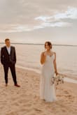 I absolutely loved this dress! I usually am a medium/large but after reading reviews I went with a small. It was slightly tight but doable! I didn't even need a hem! I just had the steps brought up to take the tension on my hips a little and it was a dream. - Katelin L.