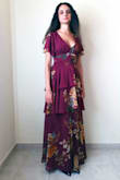 This dress is very elegant and classy!!!! It is comfortable, although with so many layers it is quite warm, so I would recommend it for a spring or autumn occasion. It is true to size, the fabric is nice and overall worth the price. I was however disappointed that after inspecting the dress upon delivery, I found that beneath one of the tiers there was fraying due to it not being stitched properly (not being over-locked) (see photo). I now have to send it to a dressmaker to have it repaired (if I wear it before fixing it, it will get worse). - Marylina A.