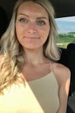 I really like this dress. Runs large so size down. The tan color is a little different than I expected but I still really liked it with my tan. Lots of compliments. The leg slit is very sexy. I liked it overall! - Ashley P.