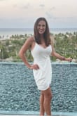 Loved this dress! I'm 5'9" 135-140lbs with curves but a flat tummy, ordered a medium and it felt like it was a little loose on the tummy and hips but I'm afraid a small would not have been quite right. Hubby loved it! - Bridgette E.