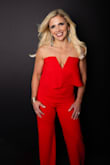 I got this jumpsuit in both black and red.  I bought them while I was a little larger so I wish I had ordered the XS instead, but this worked great too.  This jumpsuit does run a little longer compared to the open-back "thinking out loud" jumpsuit.  I love both of them! I always get a ton of compliments whenever I wear any of the jumpsuits from Lulus!  I used the red one of this jumpsuit for a headshot for my business. - Amy B.