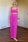 I love this jumpsuit. I wore it in Las Vegas with low heels. It is very comfortable and flattering. The material is think so it doesn't show bumps but you do need to have no show or invisible panties if you don't want pantie lines. I am normally a small or size 4. This was a perfect fit. - TINA L.