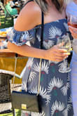 I received so many compliments when I wore this to a casual wedding in Malibu, including strangers who shouted from their car "your dress is beautiful!" Lol. It was so comfy and airy and perfect for 80-degree weather. Also classy but sexy. I will say I ordered a size up to a small, I'm always in between sizes but for this, I sized up. It was a tad tight around the waist and doesn't have much stretch. The top was super supportive though (huge bonus!) and I did not need a bra!! - Melissa M.