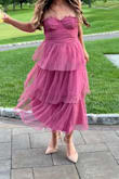 This dress fit like a glove. I have a very small chest but even still the design of the chest piece was so flattering. Dress works with and without the straps (tucked in). I got so many compliments on this outfit. Dancing and spinning is a must - Taziana M.