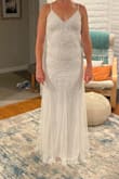 Gorgeous! I got this for my wedding dress. It fits perfectly, the beading is beautiful. I was nervous about where my arms would rub and somehow it feels soft/doesn't feel like it will irritate at all. And for the price, you just can't beat it!! - Lauren F.