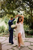 This dress was just such an easy wear. It fit like a glove. No alterations are needed. In-person it is even more beautiful! The sparkles, the color, and the slit are gorgeous! I received so many compliments on my wedding day! I would recommend this dress! - Maite M.